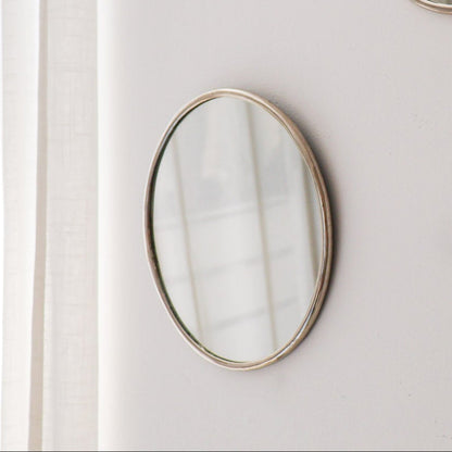 Miroir Tayra – Forme ronde en laiton, fabrication artisanale